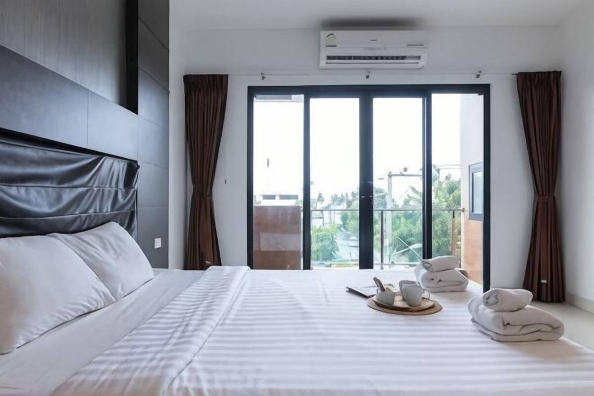 Een kluis op de kamer, verduisterende gordijnen, gratis wifi, beddengoed