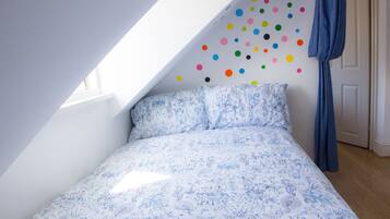 Blackout drapes, soundproofing, iron/ironing board, cribs/infant beds