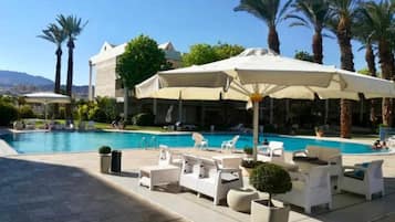 Outdoor pool, pool umbrellas, pool loungers