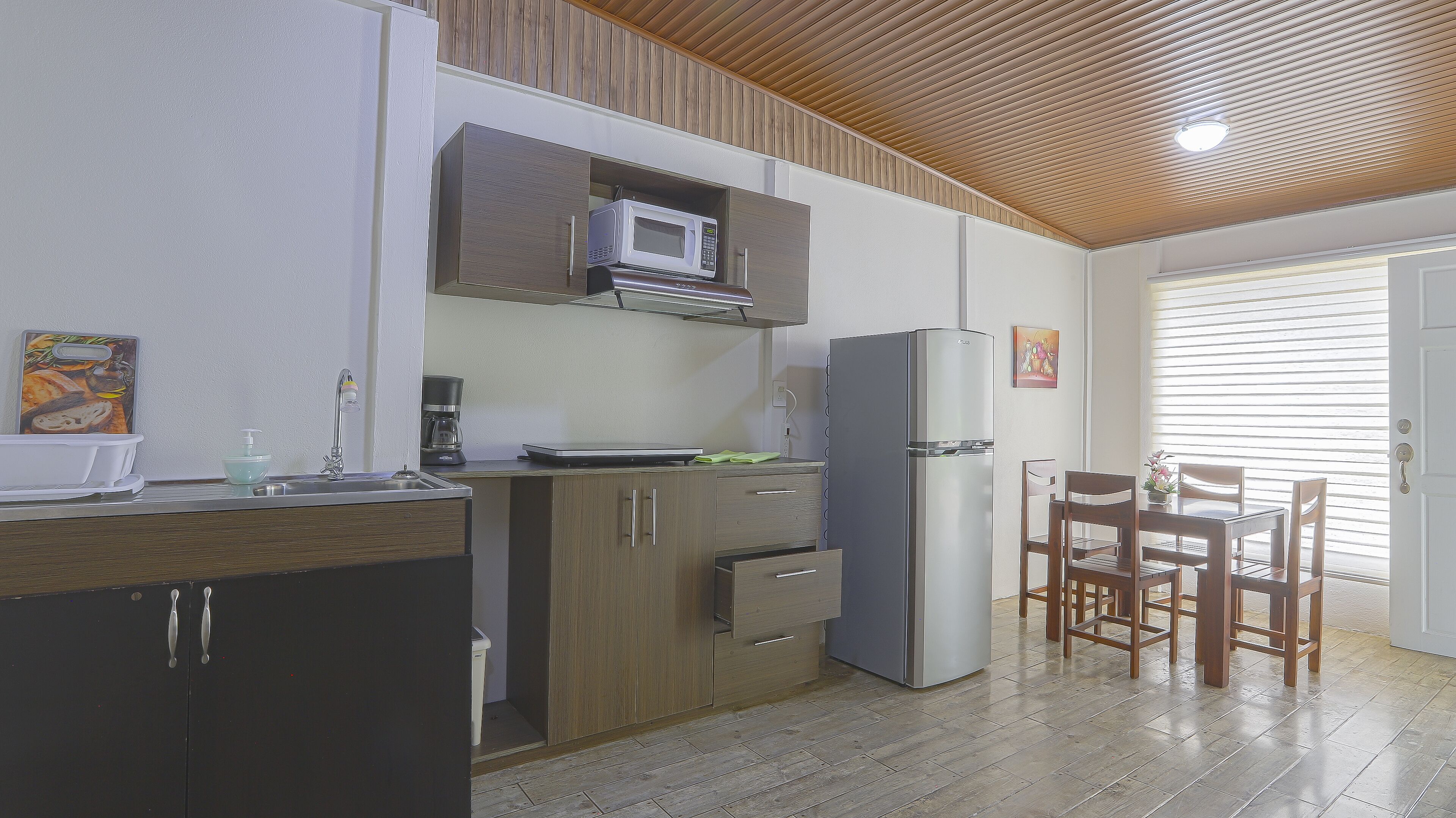 Family Apartment (1) | Private kitchen | Full-sized fridge, microwave, stovetop, coffee/tea maker
