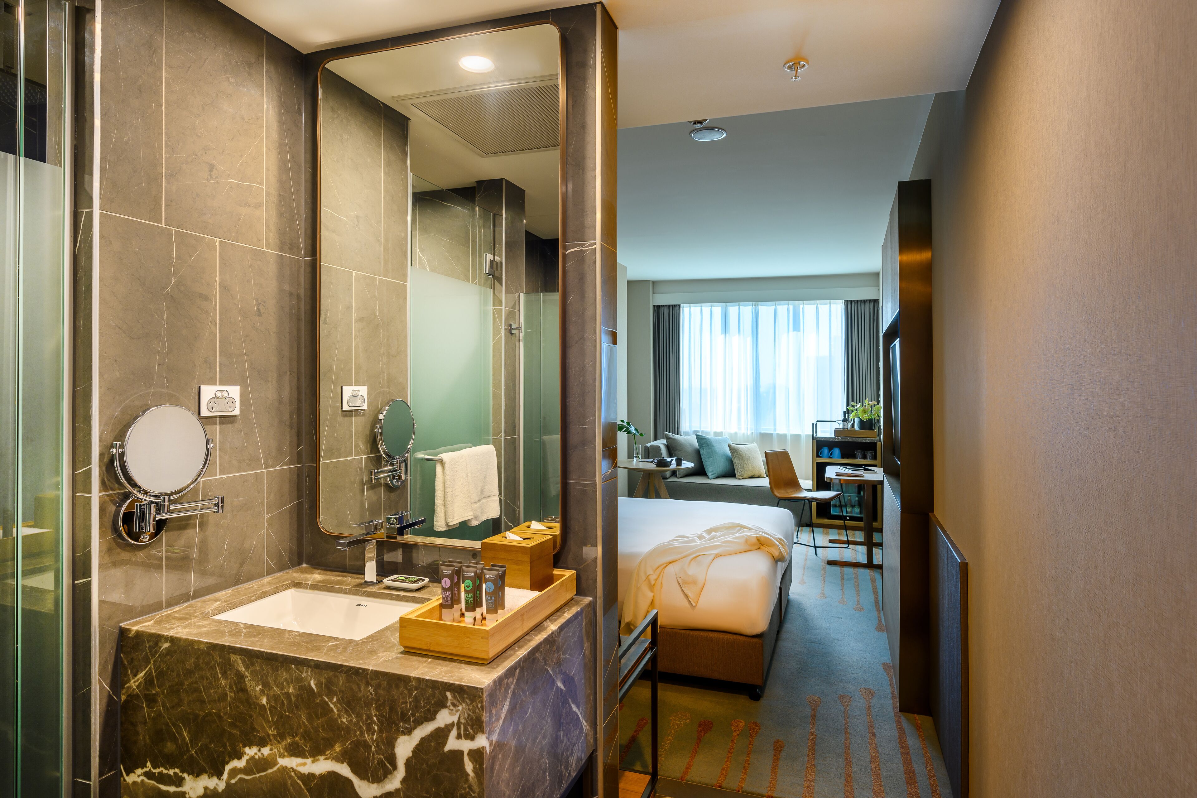 superior king room | bathroom | shower, eco-friendly toiletries, towels
