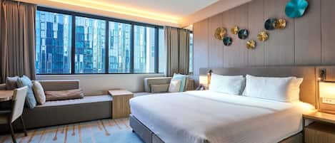 Deluxe Room, 1 King Bed | Premium bedding, minibar, in-room safe, iron/ironing board
