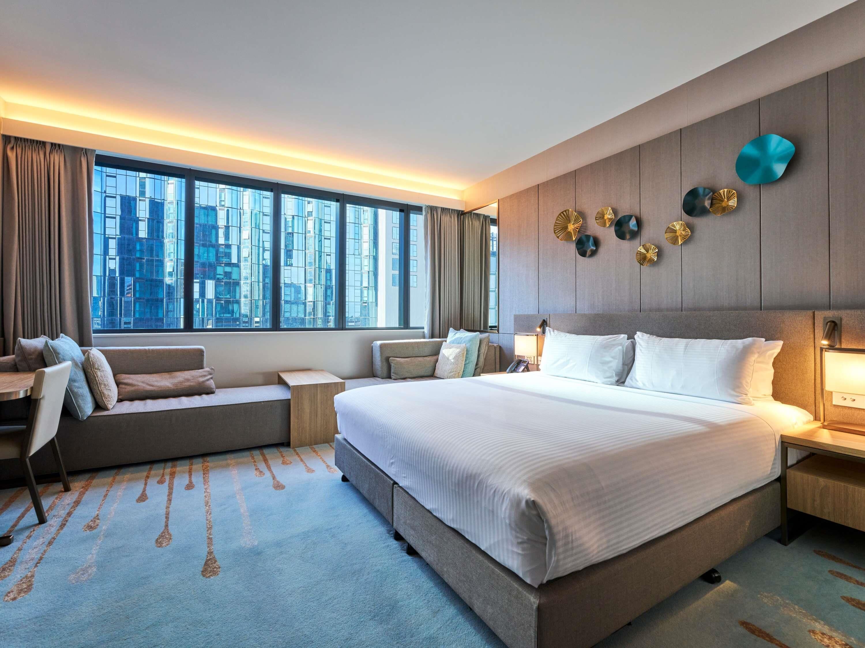 Deluxe Room, 1 King Bed | Premium bedding, minibar, in-room safe, iron/ironing board