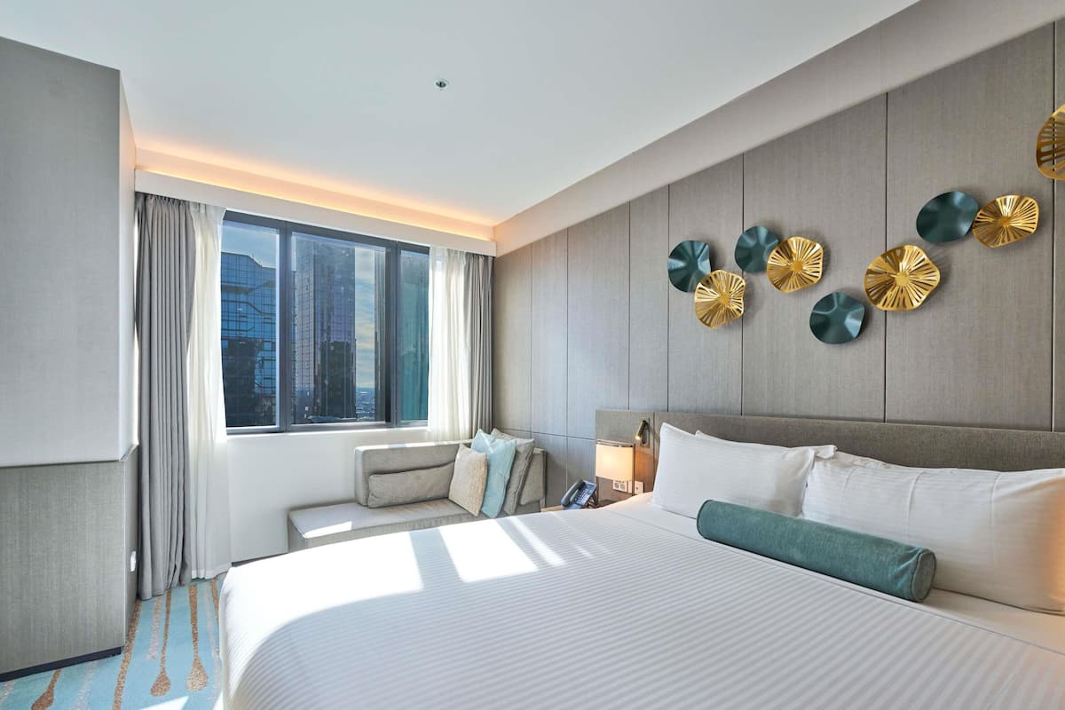 Junior Suite, 1 King Bed | Premium bedding, minibar, in-room safe, iron/ironing board