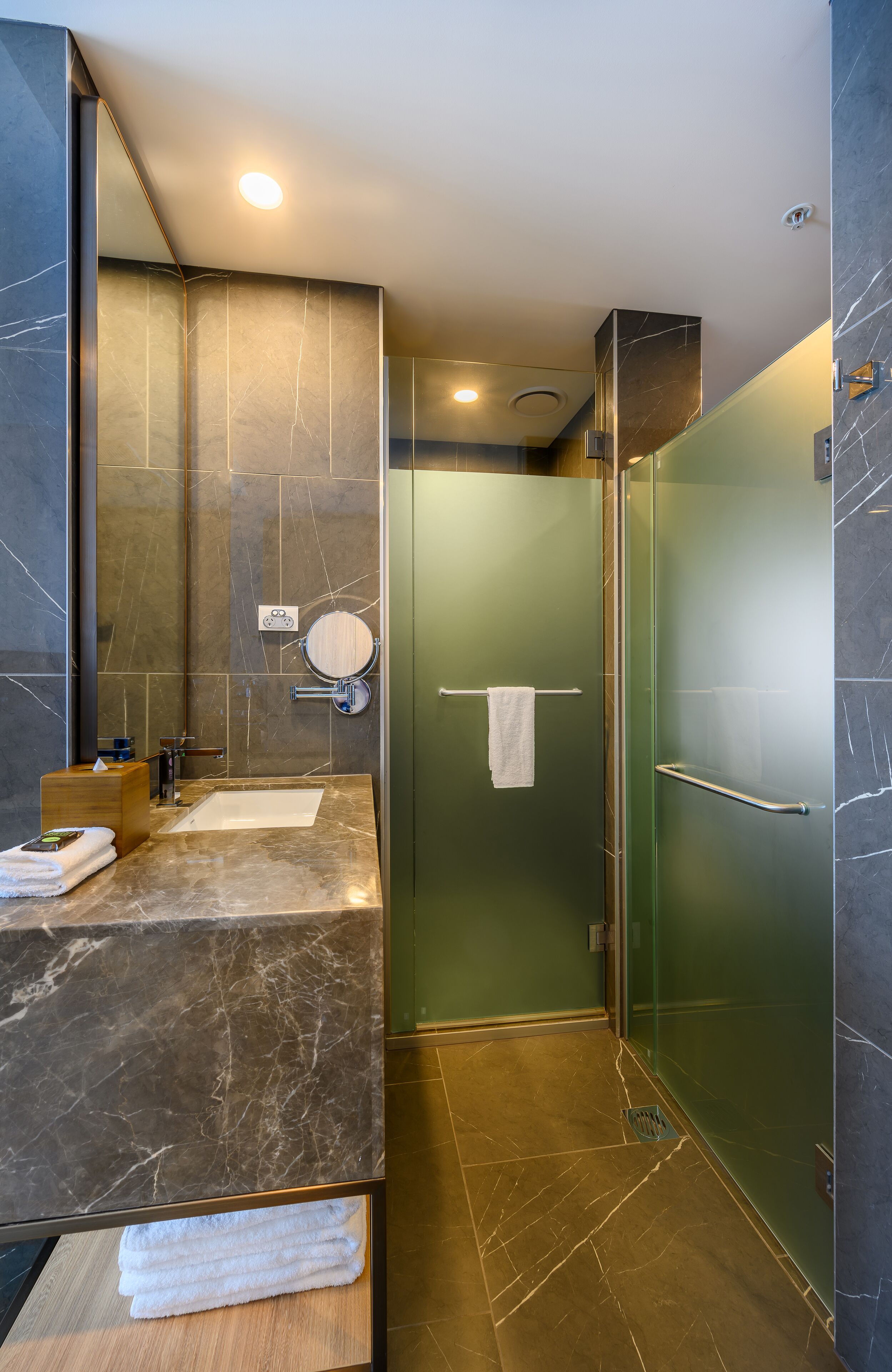 deluxe room, 1 king bed | bathroom | shower, eco-friendly toiletries, towels