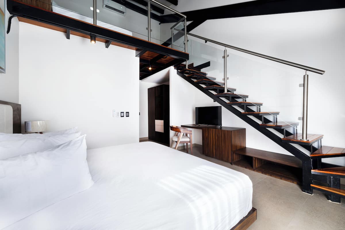 Luxury Loft, 2 Double Beds, Balcony | 1 bedroom, in-room safe, blackout drapes, iron/ironing board
