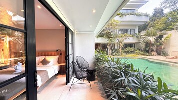 Habitación Deluxe, acceso a la piscina | Vistas desde la habitación