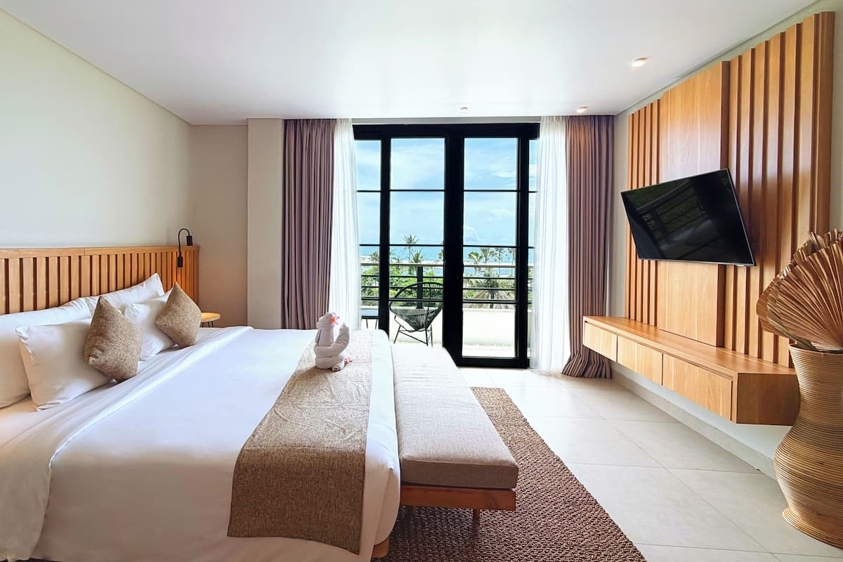 Camera Deluxe, vista oceano | Minibar, una cassaforte in camera, una scrivania, postazione laptop