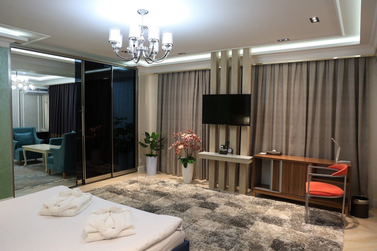 Apartment, Refrigerator & Microwave, City View | 1 bedroom, in-room safe, desk, blackout drapes