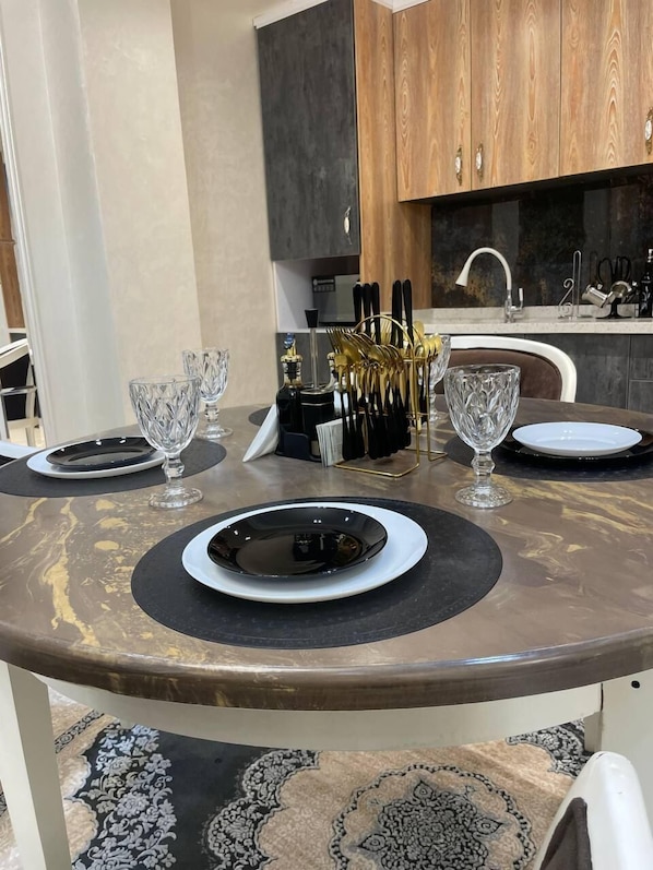 Apartment, Refrigerator & Microwave, City View | Private kitchen | Electric kettle