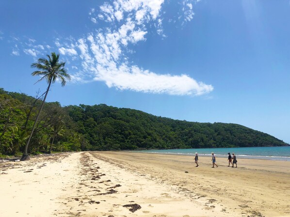On the beach, sun-loungers, beach umbrellas, beach towels