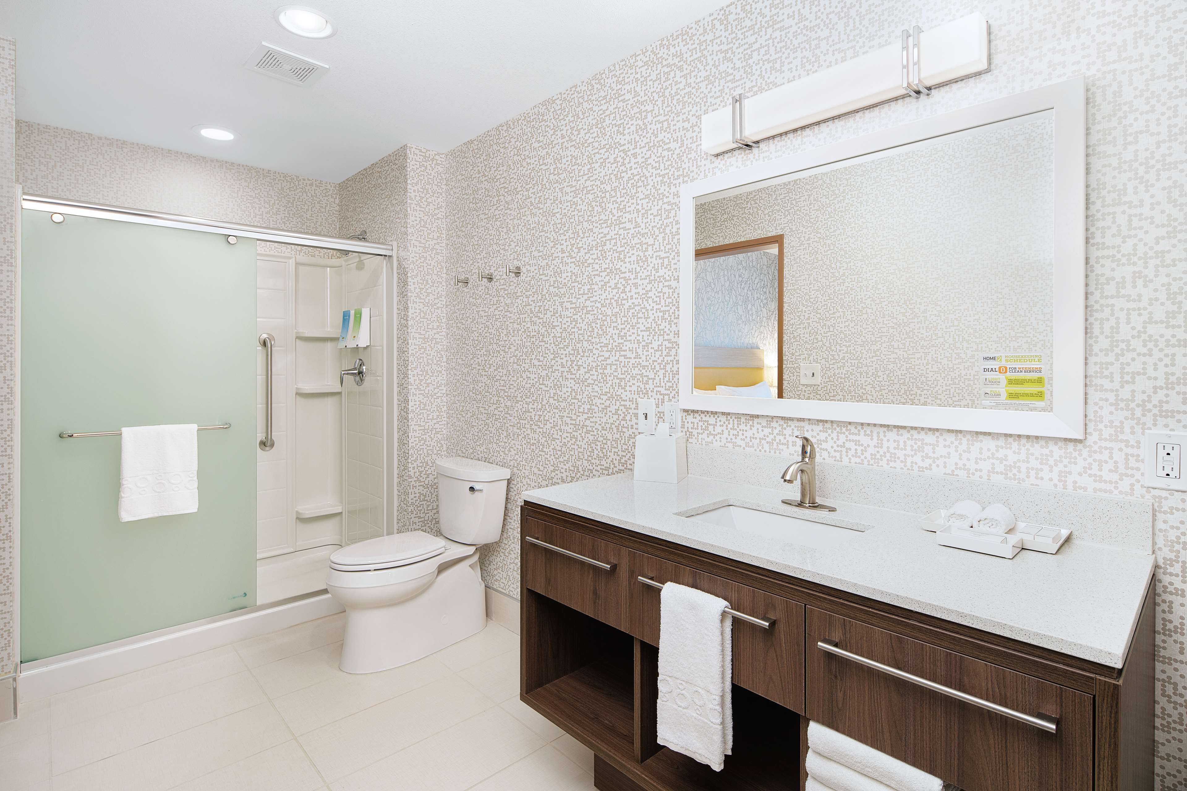 suite, 1 king bed, accessible (mobility & hearing, roll-in shower) | bathroom | free toiletries, hair dryer, dressing gowns, towels