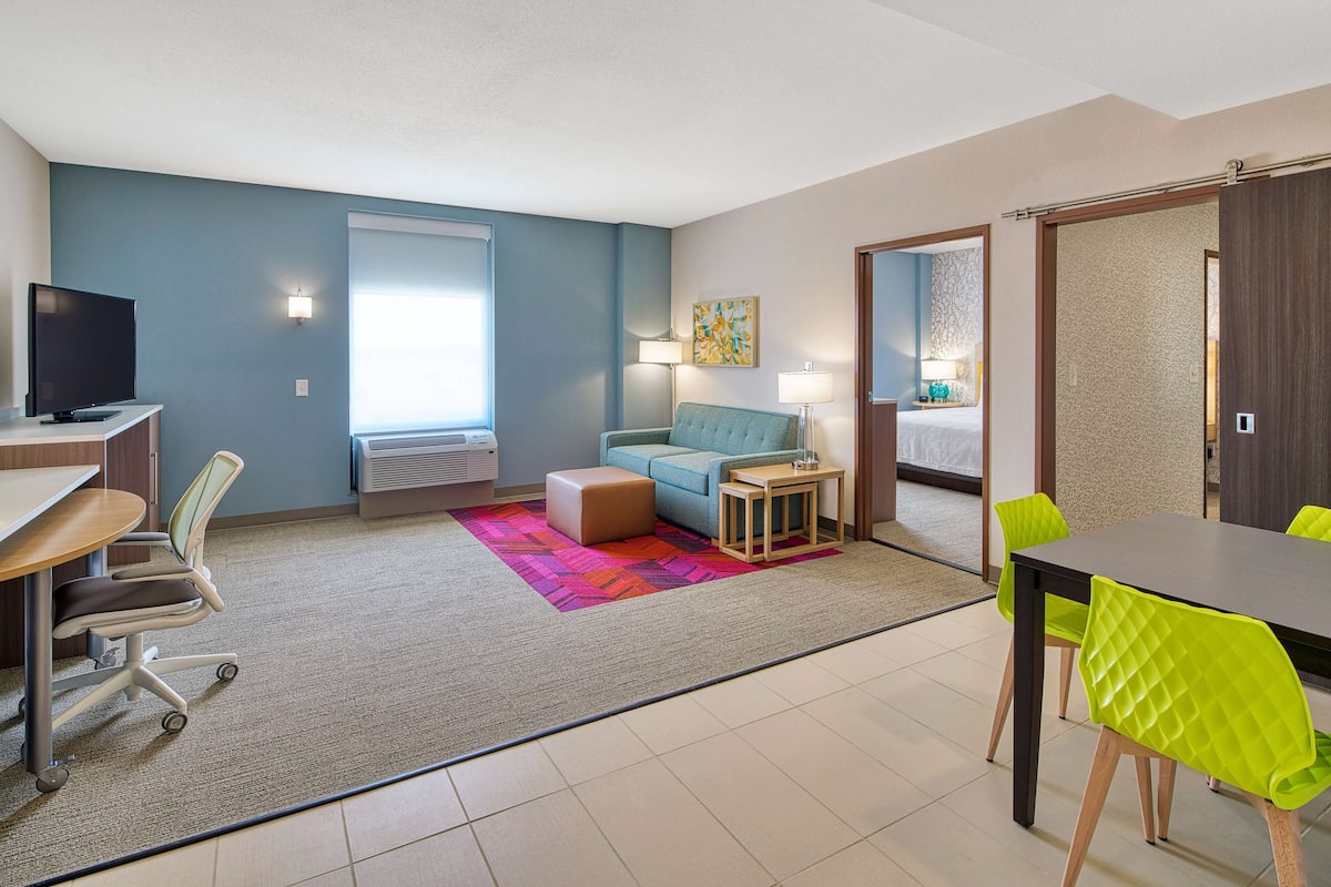 suite, 1 bedroom, non smoking | living area | 42-inch lcd tv with cable channels, tv, mp3 dock