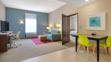 Suite, 1 King Bed, Accessible (Mobility & Hearing, Roll-in Shower) | Living area | 42-inch LCD TV with cable channels, TV, MP3 dock