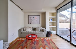 Apartment, 1 Bedroom (5th floor) | Living area | 60-cm flat-screen TV with cable channels, TV - Kolonaki Boutique Apartments by Olala Homes (Athens)