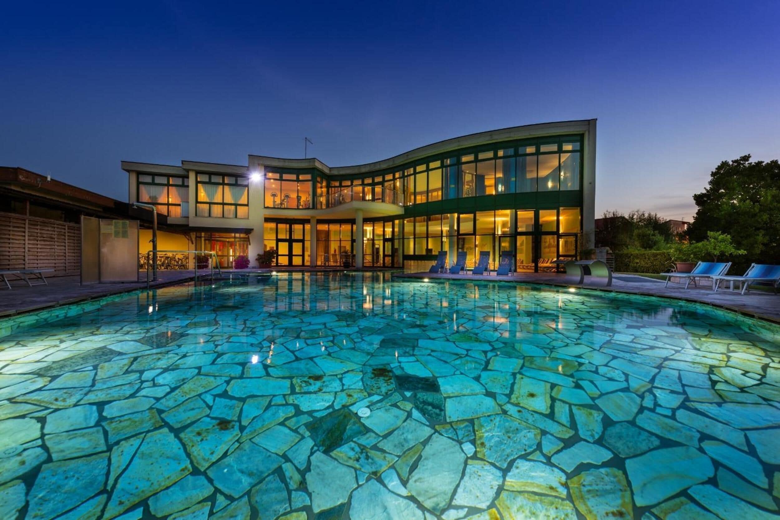 Indoor pool, seasonal outdoor pool, open 8 AM to 7 PM, pool umbrellas