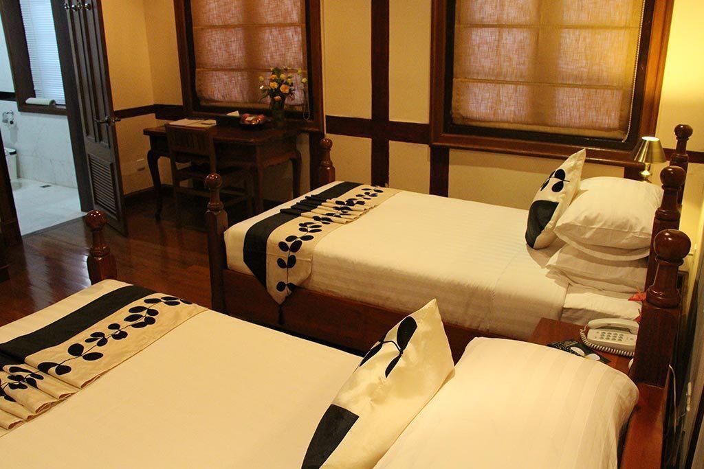 Suite, 2 Tempat Tidur Twin | Minibar, brankas, meja kerja, dan tirai kedap cahaya