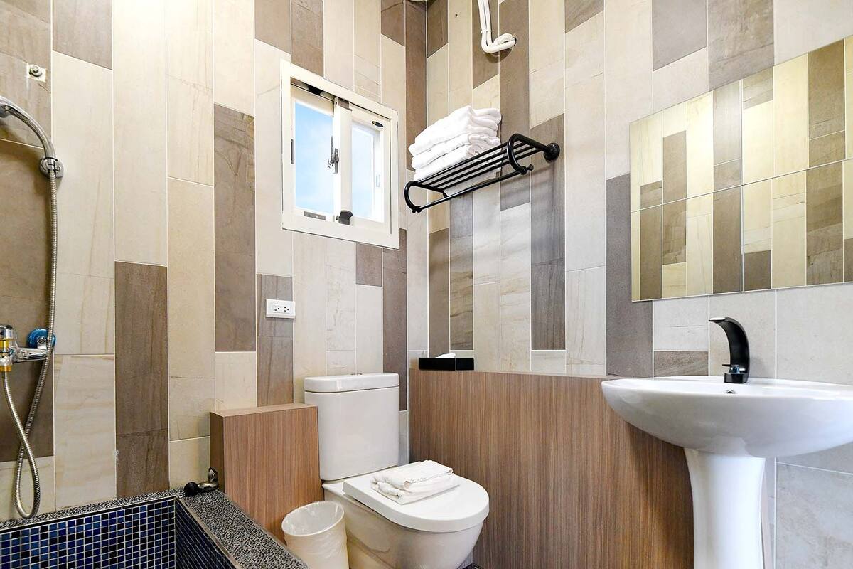 panoramic loft | bathroom | slippers, towels