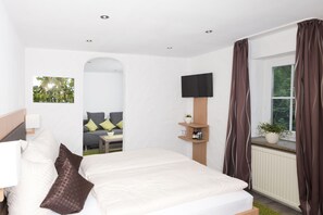 Verduisterende gordijnen, gratis wifi, beddengoed