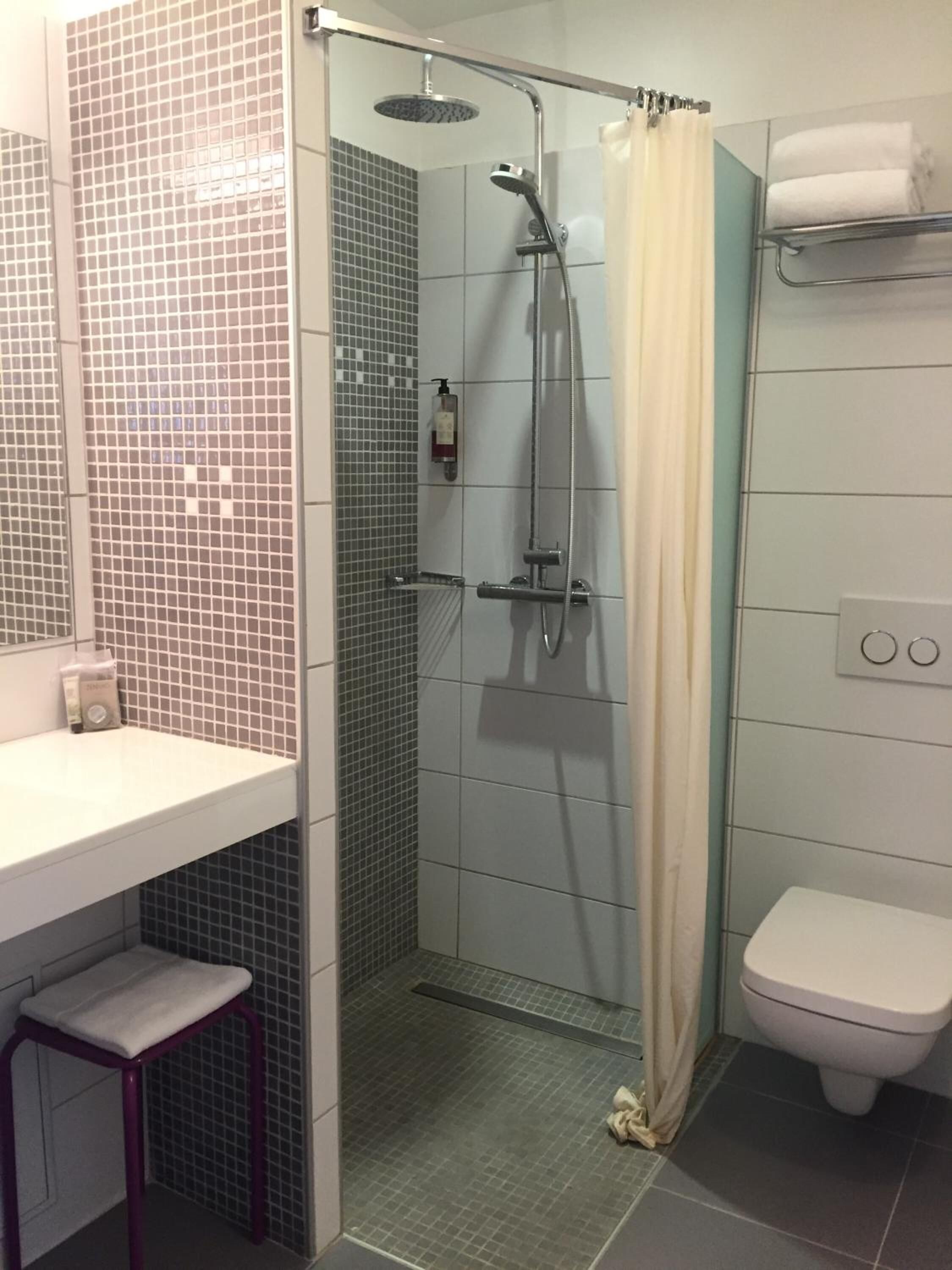 shower, free toiletries, hair dryer, towels