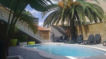 Outdoor pool, pool loungers