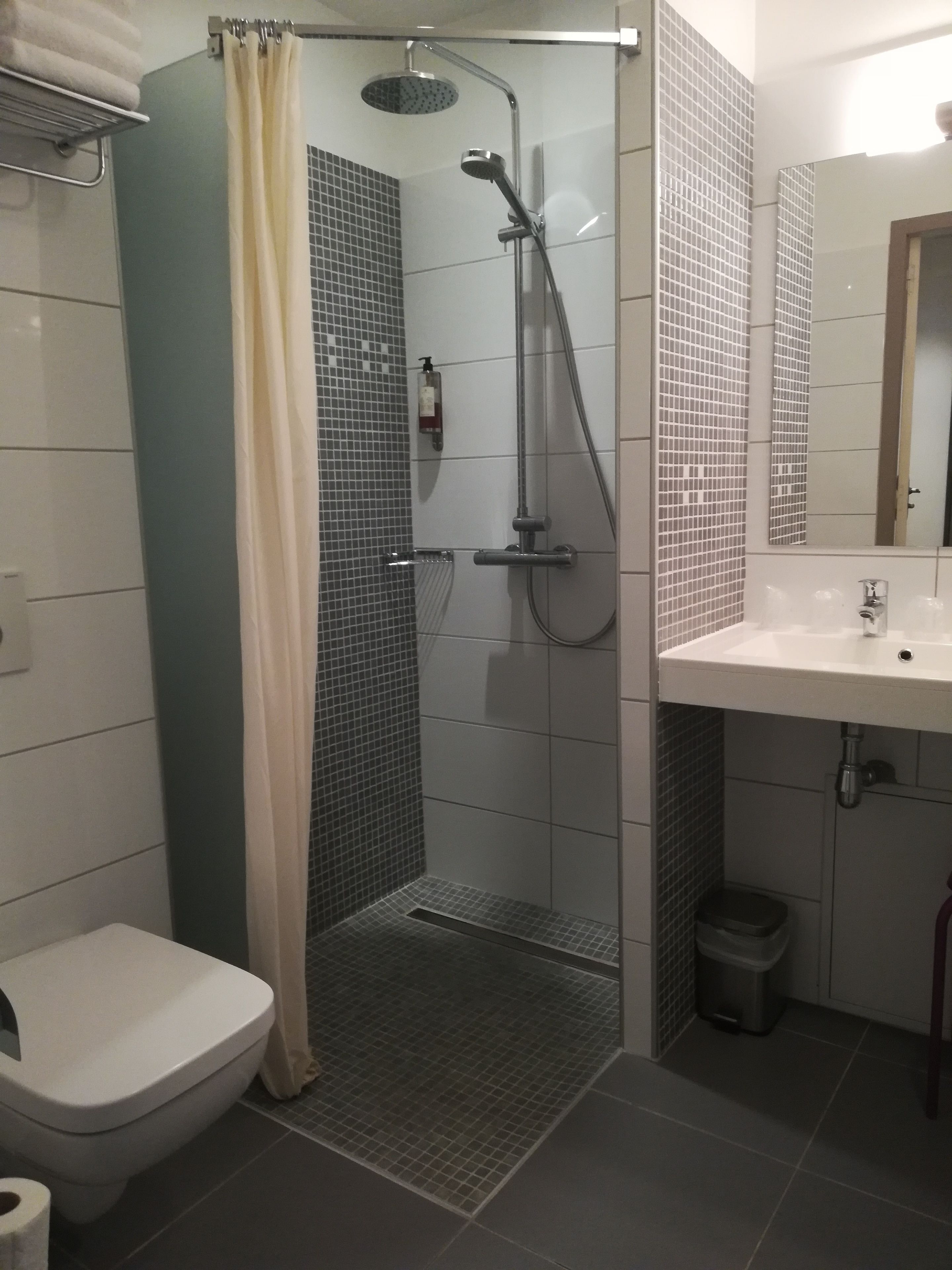 shower, free toiletries, hair dryer, towels