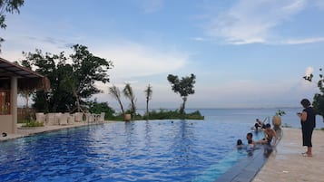 2 outdoor pools, open 7:00 AM to 6:00 PM, pool umbrellas, sun loungers