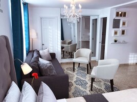 Tabla de planchar con plancha, wifi gratis y ropa de cama 