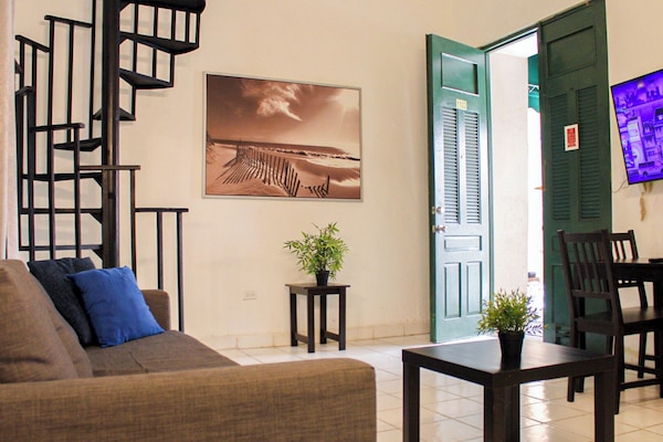 Apartment, 1 Bedroom | Living area | Flat-screen TV