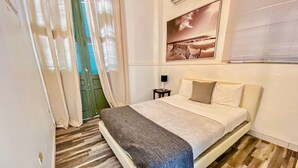 1 habitación, tabla de planchar con plancha, wifi gratis y ropa de cama 