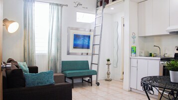 Apartment, 1 Bedroom | Living area | Flat-screen TV