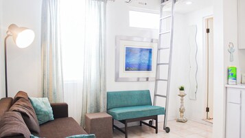Apartment, 1 Bedroom | Living area | Flat-screen TV