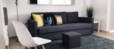 Studio, Multiple Beds | Living area