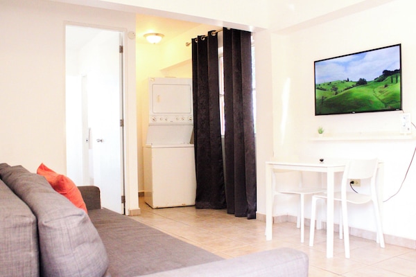 Apartment, 1 Queen Bed with Sofa bed | Living area | Flat-screen TV