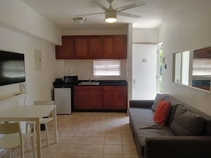 Apartment, 1 Queen Bed with Sofa bed | Living area | Flat-screen TV