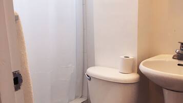 Apartment, 1 Bedroom | Bathroom | Shower, free toiletries, towels