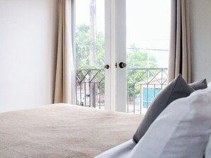 Apartamento, 2 quartos | 2 quartos, ferros/tábuas de passar roupa, Wi-Fi de cortesia