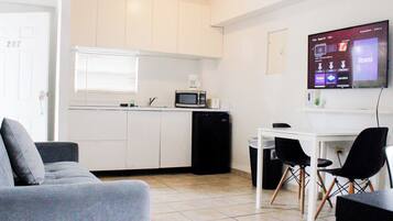 Apartment, 2 Bedrooms | Living area | Flat-screen TV
