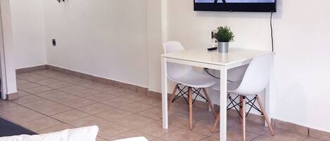 Apartment, 1 Bedroom | Living area | Flat-screen TV