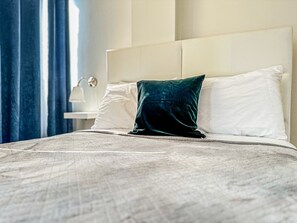 2 habitaciones, tabla de planchar con plancha y wifi gratis 