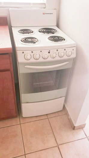 Apartamento, 1 habitación | Cocina privada | Frigorífico, microondas, horno y placa de cocina