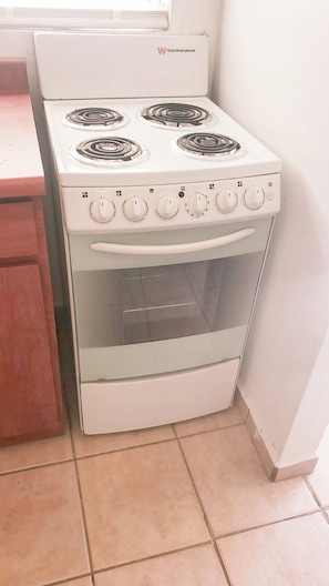 Apartamento, 1 habitación | Cocina privada | Frigorífico, microondas, horno y placa de cocina