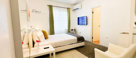 Deluxe kamer | Een strijkplank/strijkijzer, gratis wifi, beddengoed