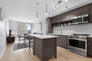 Premium Apartment, 2 Bedrooms, Balcony | Private kitchen | Coffee/tea maker, cleaning supplies, paper towels