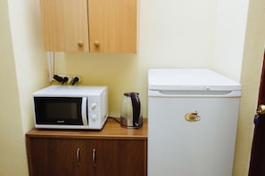 Fridge, microwave, cookware/dishes/utensils