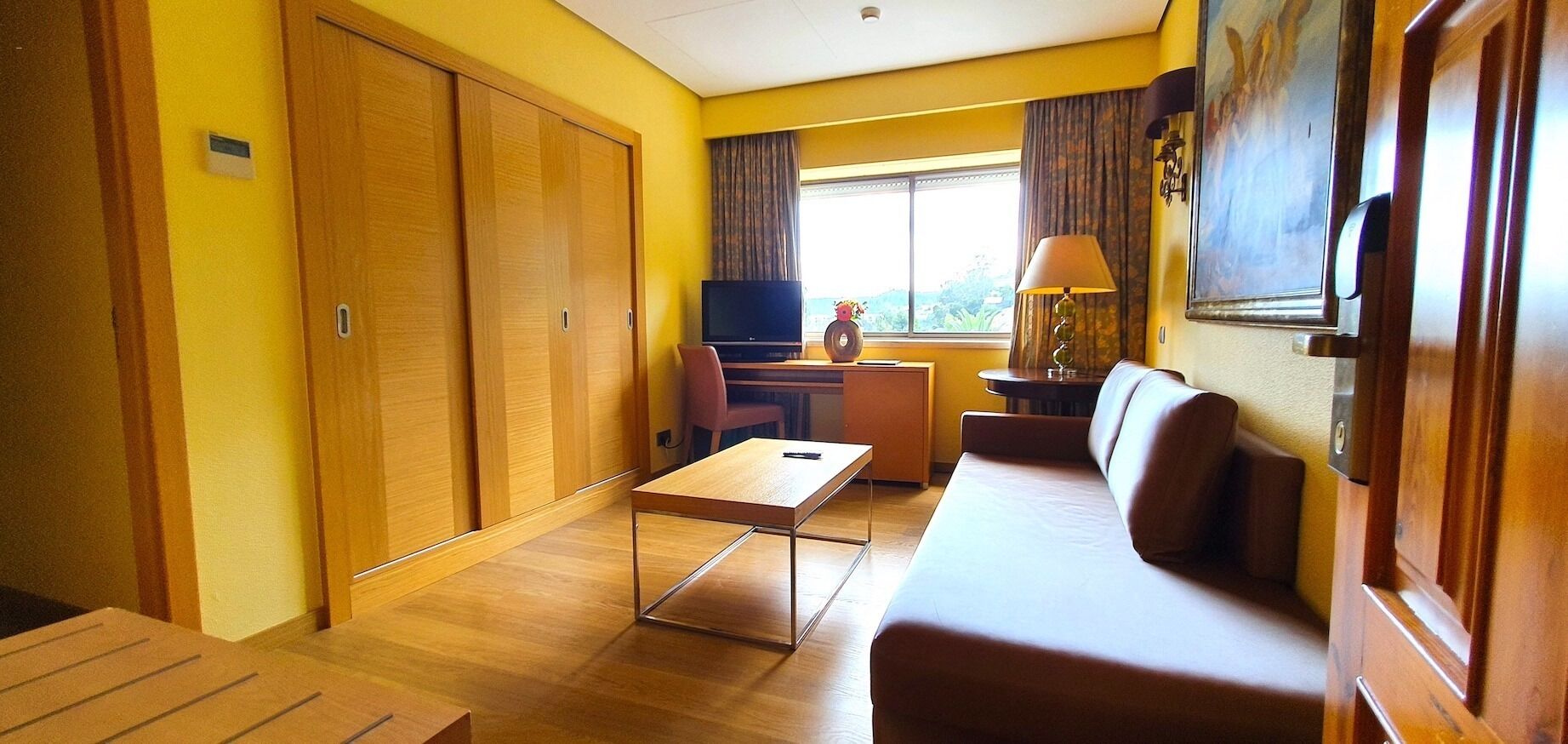 junior suite | minibar, in-room safe, desk, blackout curtains