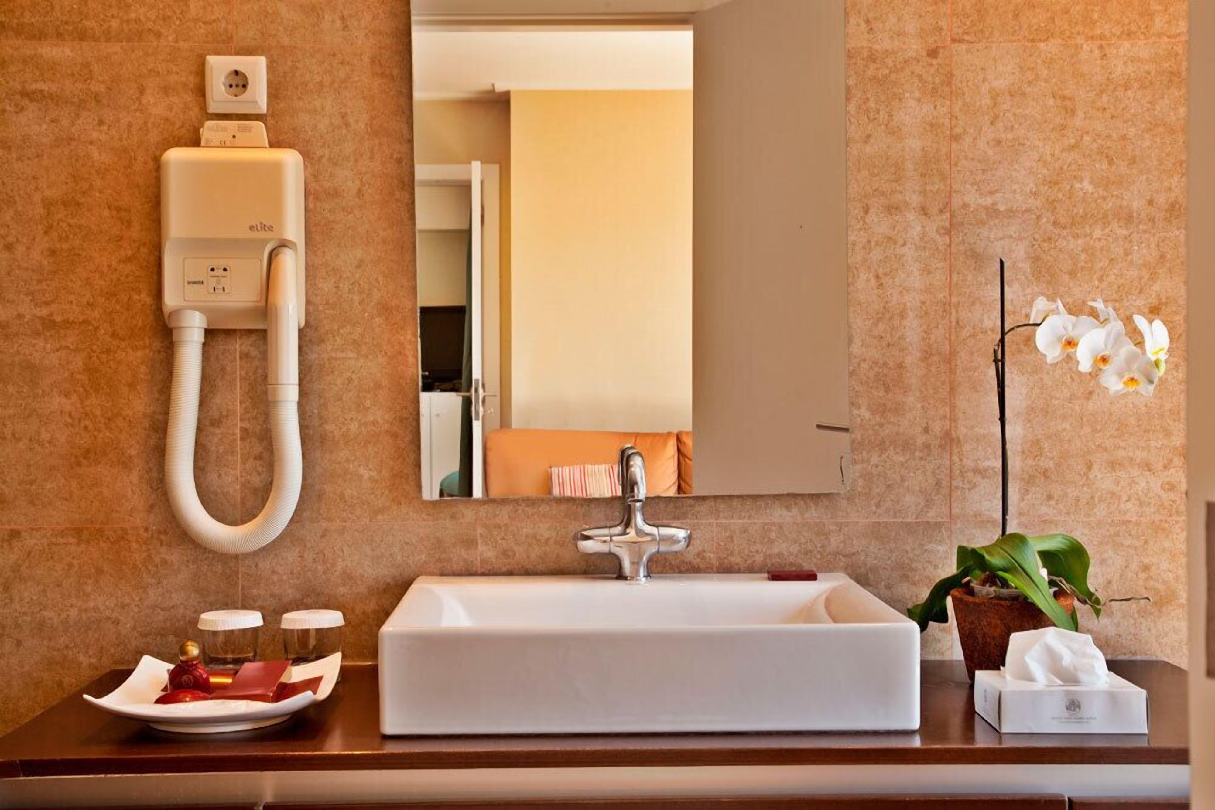 suite | bathroom | bathtub, deep-soaking bathtub, hair dryer, bathrobes