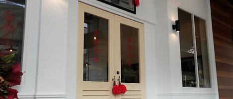 A building with a sign reading "Hock Kee Restaurant" above the entrance.