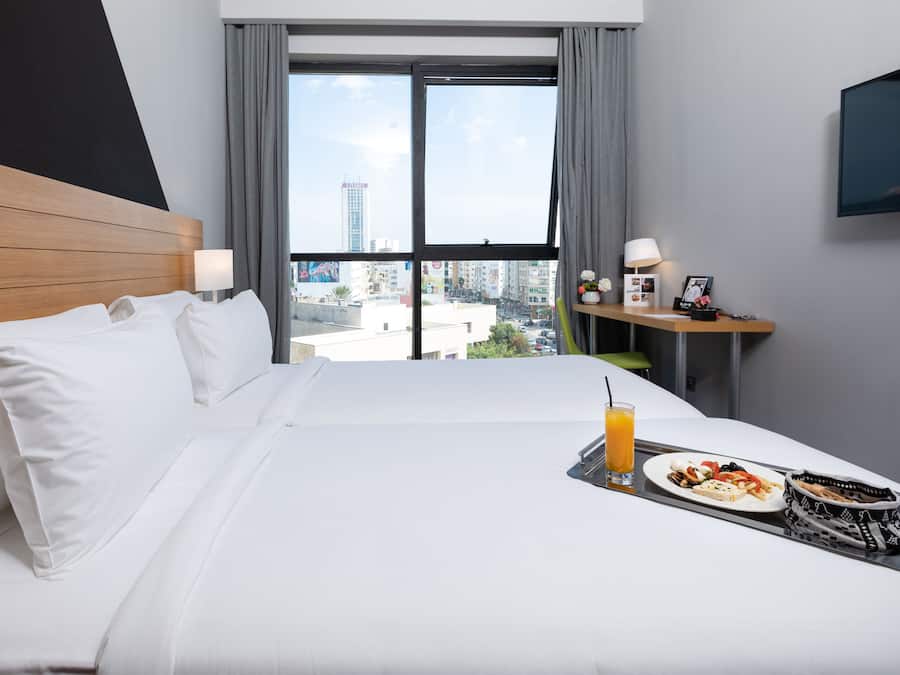 Ropa de cama de alta calidad y minibar