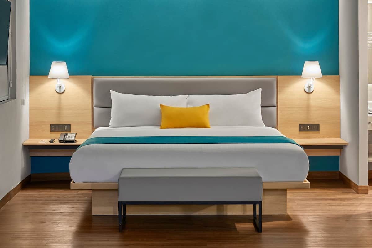 desk, blackout curtains, iron/ironing board, free cots/infant beds